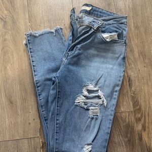 Levi's High Rise Blue Distressed Jeans